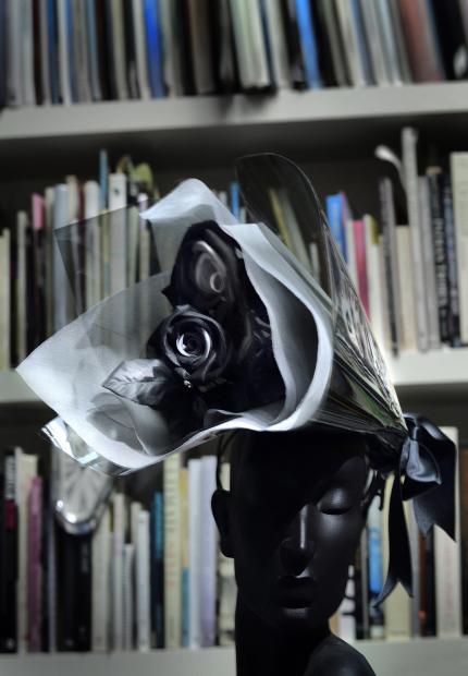 Stephen Jones Millinery Spring Summer 2018 A bouquet of satin roses wrapped in cellophane and organza 02 Spontaneous